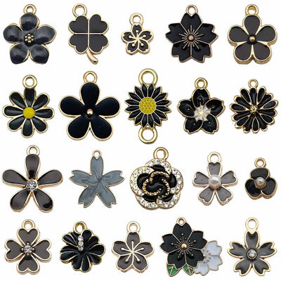 Colorful cherry blossom charms arranged on a light background