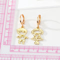 Gold Tone Openwork Boy and Girl Figure Huggie Earrings view 5