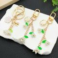 Blossom Bee Butterfly Shell and Bell Flower Keychains view 4