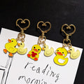Yellow Duck Pair Heart-Clasp Charms in Three Designs view 2