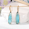 Gold Tone Long Oval Faceted Crystal Hook Earrings in Seven Colors view 8