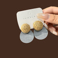 Three Woven and Wood Look Round Statement Earrings view 6