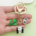 Panda Charm Keychains Featuring White Apple Across 45 Pictured Variations view 2