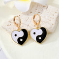 Gold Tone Crescent Disc and Yin Yang Heart Huggie Earrings view 8