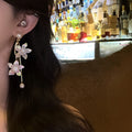 Gold Tone Floral Pearl Drop Earrings With Crystal Accents view 3