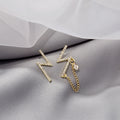 Gold Pavé Lightning Bolt Asymmetric Stud Earrings Chain Drop view 1
