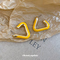Yellow Geometric Hoop Stud Earrings in Triangle and Oval Shapes view 4