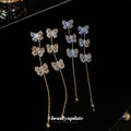 Crystal Butterfly Chain Drop Earrings in Gold Tone view 4