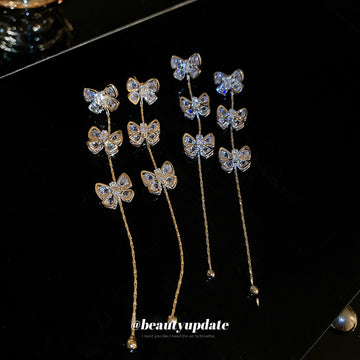 Crystal Butterfly Chain Drop Earrings in Gold Tone