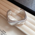 Sixteen Gold Or Silver Wave Crossed Openwork And Wide Cuff Designs view 4