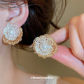 Layered Gold Tone Flower Stud Earrings with Pearl Centers view 1