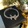 Silver Tone Clear Baguette Crystal Bracelet With Bow Center view 3