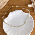 Coastal Charm Necklaces with Shells Stars Pearls and Blue Beads view 9
