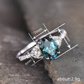 Blue-Green Oval Solitaire Three-Stone Ring In Silver Tone view 4
