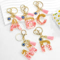 Resin Initial Letter Keychain with Evil Eye and Pink Tassel view 2