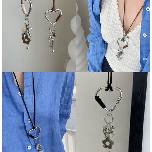 Black Cord Heart Dog Charm product shown worn on an ear