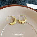 Gold Tone Sculpted Crescent Hook Earrings with Detailed Finish view 4