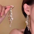Crystal Waterfall Tassel Drop Earrings in Gold Tone view 6