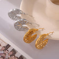 Crinkled Disc Hoop Earrings in Gold and Silver Tone view 4