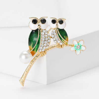 Owl Trio Branch Brooch shown alone on a light background