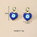 Gold Tone Hammered Stud Blue Evil Eye Drop Earrings view 4