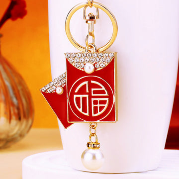 Red Enamel Fortune Envelope Keychain with Pearl Like Bead Drop