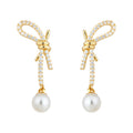 Gold Tone Clear Stone Bow Long Tail And White Pearl Stud Earrings view 5