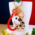 Jeweled Cow Keychains With Enamel Spots and Braided Wrist Straps view 2
