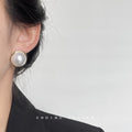 Large White Pearl Gold Rim Circular Stud Earrings Pair view 2