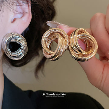 Interlocking Triple Ring Gold And Silver Tone Stud Earrings