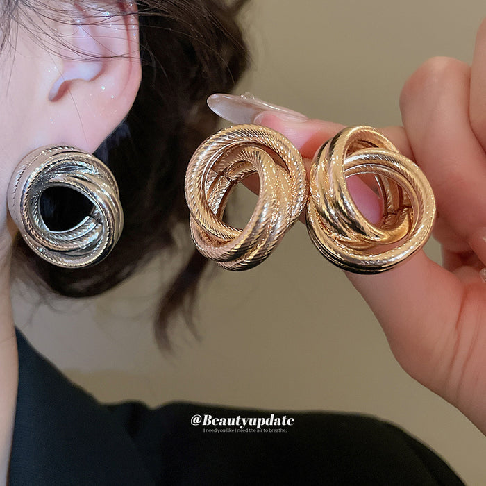 Interlocking Triple Ring Gold And Silver Tone Stud Earrings