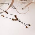 Black Cord Butterfly Bead Tassel Finished Pendant Necklace view 1