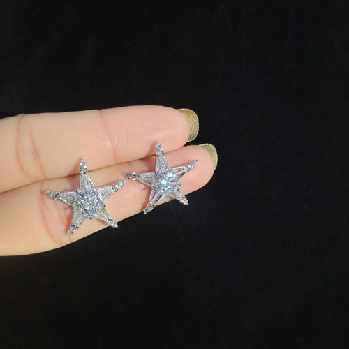 Styled view showing five-point starfish silhouettes covered in clear stones