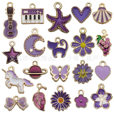 Colorful assorted shape charms arranged on a light background