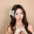 Pale Green And Blue Orchid Hair Clip With Pearl Like Center view 3