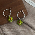 Silver Tone Round Hoop Earrings With Translucent Flowers In Two Colors view 4