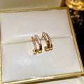 Gold Tone Double Bar Crystal Huggie Earrings for Women view 2