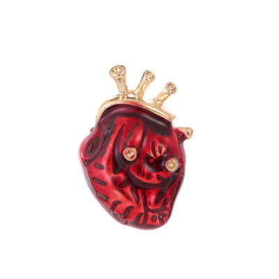 Front product view of the anatomical heart brooch pin in red and gold