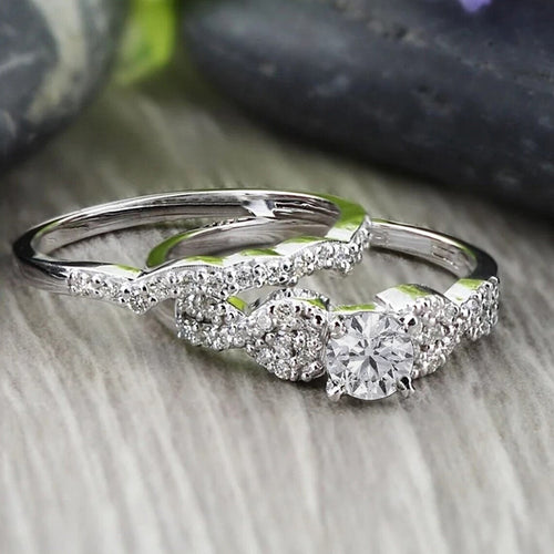 Close view of clear stone marquise ring sets in gold and silver tone finishes