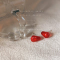 Red Translucent Resin Seed Shaped Stud Earrings Pair view 6