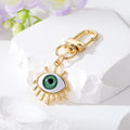 Gold Evil Eye Keychains Spikes Lashes Framed Six Styles view 3