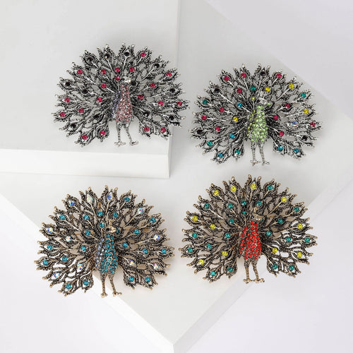 Main front view of Large Crystal Peacock Brooch In Four Color Designs