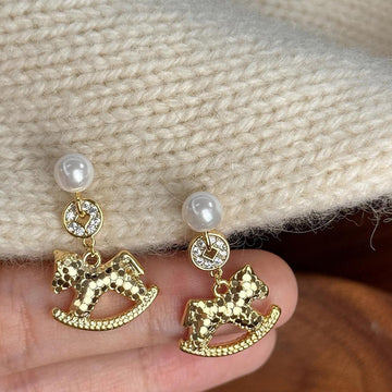 White Pearl And Crystal Rocking Horse Drop Earrings