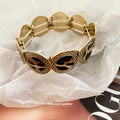 Leopard Print and Leather Look Stretch Disc Bracelets view 4