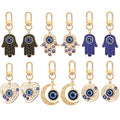 Twelve Piece Gold Tone Hamsa Heart and Crescent Evil Eye Keychain Set view 1
