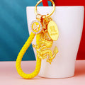 Gold Tone Small Dragon Keychains with Seven Braided Fortune Loop Colors view 3