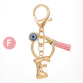 Gold Tone Initial Letter Keychain with Evil Eye and Pink Tassel view 11