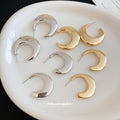 Pair of Metal Tone Wide Polished C-Shaped Hoop Earrings in Two Sizes view 4