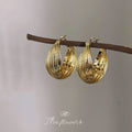 Gold Multi Band Twisted Hoop Earrings Geometric Ribbed Hoops view 1