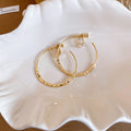 Faceted Bead Hoop Clip On Earrings in Gold and Silver Tones view 7